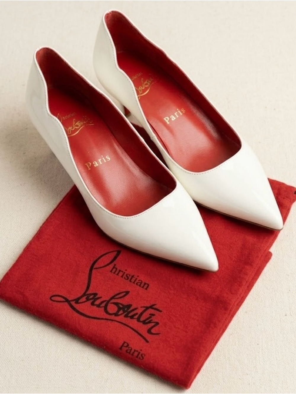 Christian Louboutin White Pointed Toe Leather Pumps with Red Interior
